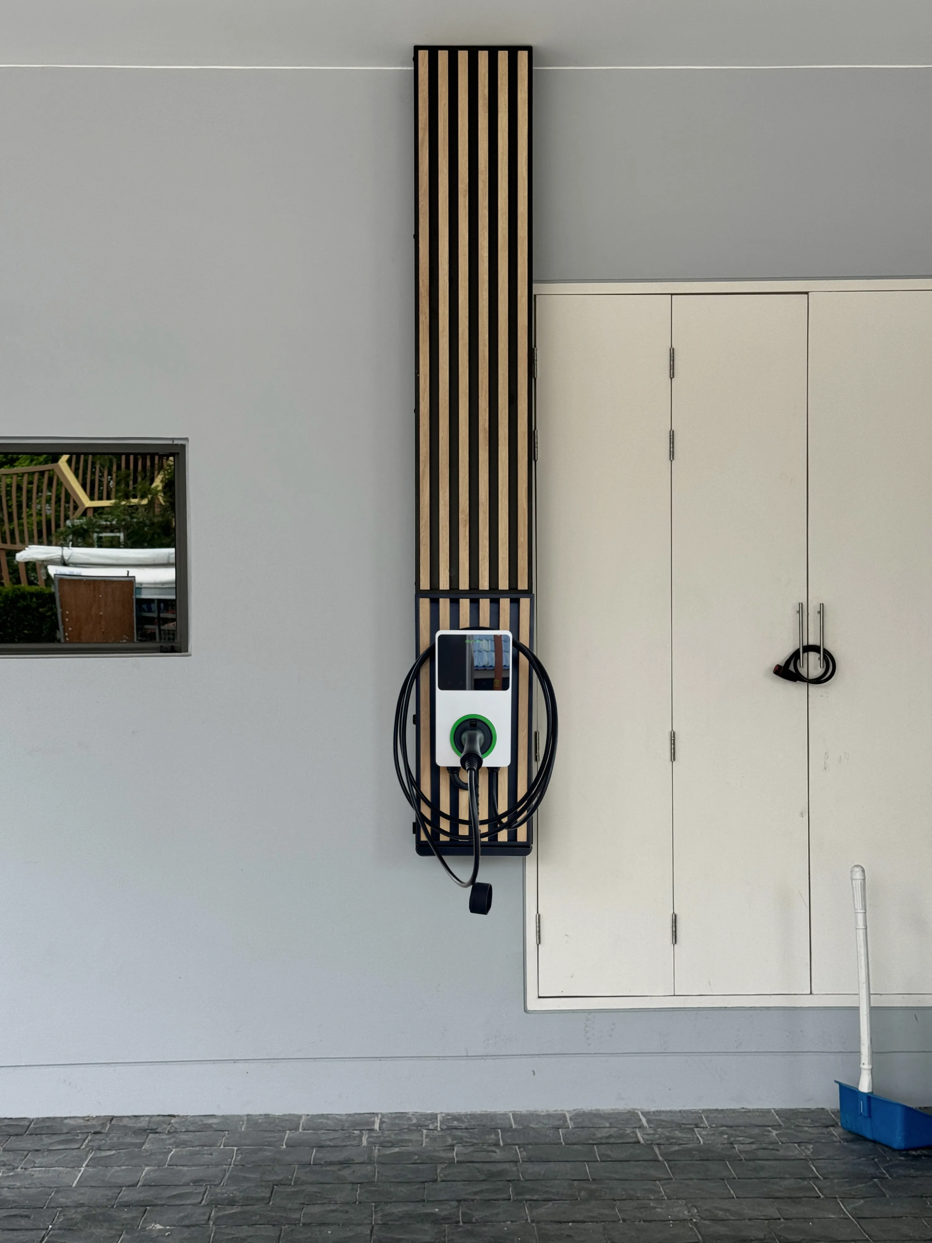 Autel MaxiCharger 7.4kW with wall battens light brown install by Auintech